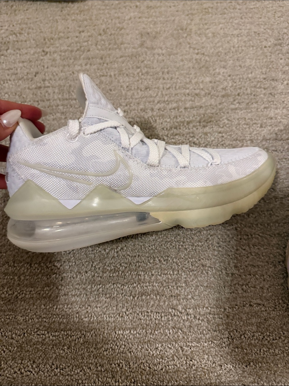 Nike White Low-Cut Basketball Shoe with Translucent Sole Accents